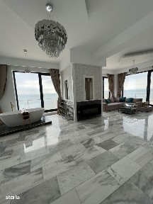 Penthouse mobilat lux, vedere frontală la mare