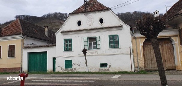 Casa de vanzare cu teren 1670 mp