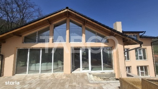 Casa de vanzare 405 mp utili 2 garaje 250 mp terase Slimnic Sibiu