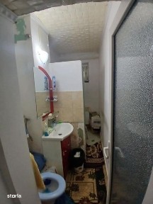 Vând apartament cu 2 camere,hol,bucatarie,baie,balcon