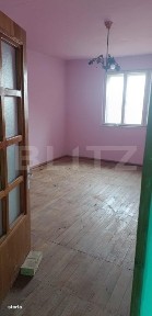 Casa cu 3 camere, bucatarie si baie, 105 mp si un teren de 1900 mp