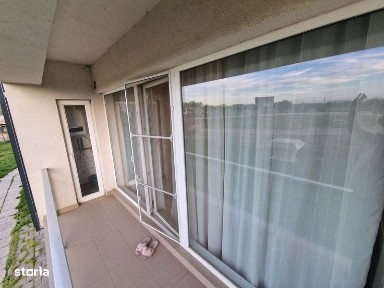 Apartament 3 cam mobilat cu balcon parter bloc nou rezidential
