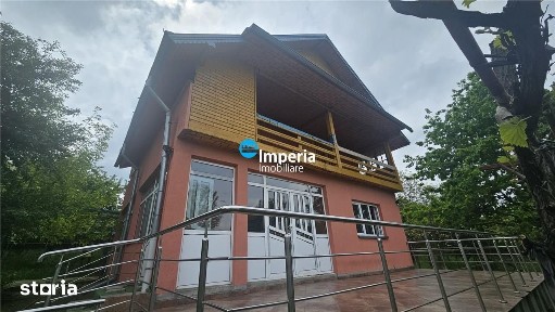 Casa deosebita in mijlocul naturii, cu teren generos si priveliste pan