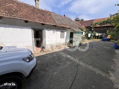 Casa de vanzare 4 camere 2 bai 1162 mp de curte si gradina in Toderita