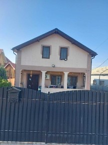 Vand casa parter 120 mp,teren 1000 mp + foisor si bucatarie vara 50 mp