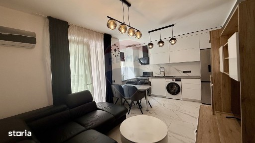 Apartament modern, cu curte și două locuri de parcare-bloc nou