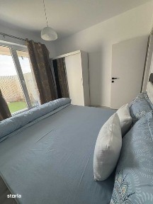 Apartament utilat si mobilat, centrala proprie + gradina