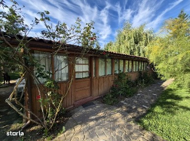 Cabana de lemn cu fundatie 86 mp+ livada pomi fructiferi+teren 847 mp
