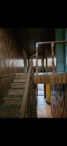 Casa de vanzare,7 dormitoare,2 bai,2 living,livada,incalzire centrala