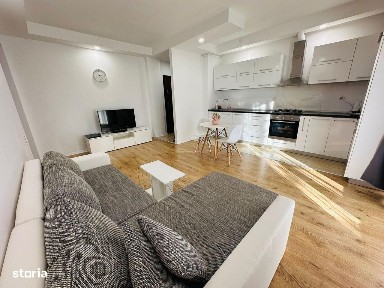 COSMOPOLIS - Apartament cu 2 camere si gradina, mobilat si utilat.
