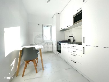 1 CAM, COMISION 50 % (225 EURO),CENTRU, PARCARE,UNIREA TOWERS