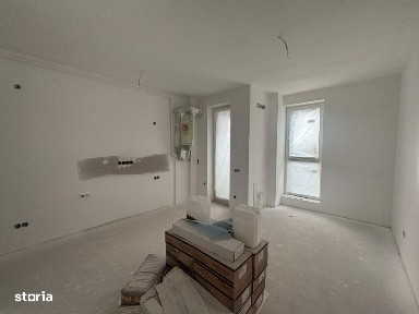 Vanzare - bloc nou, garsoniera la parter cu parcare privata, finisata