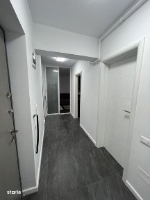 Garsoniera si loc de parcare si curte