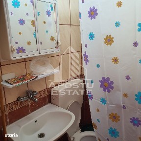 Garsoniera,parter, cu toate utilitatiile, Dambovita