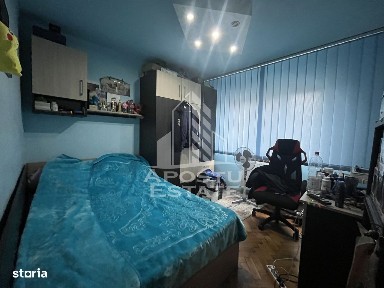 Apartament cu 3 camere,2 bai, etajul 1,centrala proprie,zona Girocului
