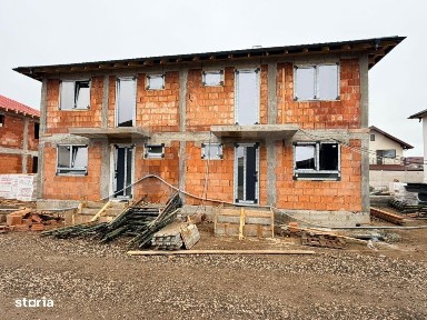 Casa noua cu 3 dormitoare, 2 bai si teren de 220 mp