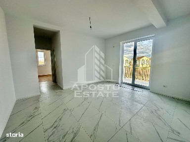 Apartament cu 2 camere, bucatarie inchisa, etaj intermediar, Giroc