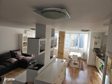 Apartament modern cu 3 camere și garaj, zonă centrală