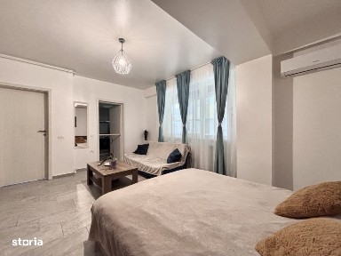 Studio modern langa plaja - termen lung