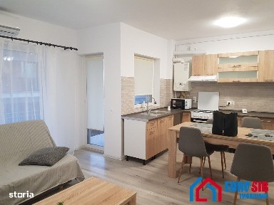 Apartament cu 3 camere, curte 150 mp de închiriat zona Calea