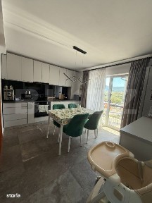 Apartament cu 3 camere, 65 mp si un foisor cu gradina de 191 mp