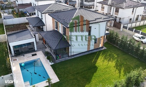 Casă modernă de vânzare Berceni, 5 camere, 4 băi, piscină și foisor
