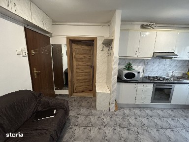 Inchiriez apart.3 cam.central,in spate la BCR,modern,centrala proprie