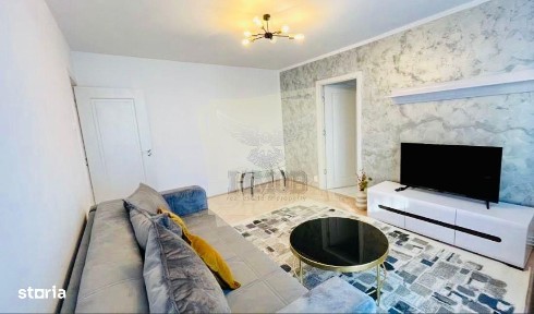 Apartament renovat etajul 2 cu 2 camere si balcon zona centrala