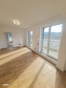 Apartament finisat, 52 mp utili, terasa 34 mp, zona Terra