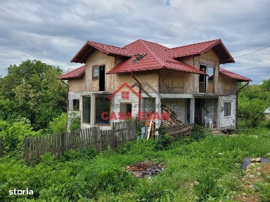 Casa 2010 in Scorteni 7 camere teren 1222mp 62.000e