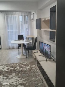 Garsoniera confort 1, otopeni, complet mobilata, stb+tren 5-10 minute.