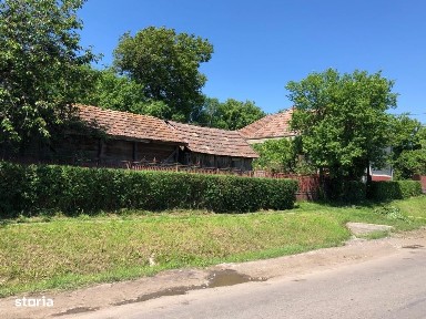 Casa 2 camere bucatarie 2 bai din cărămidă curte mare si teren Râciu