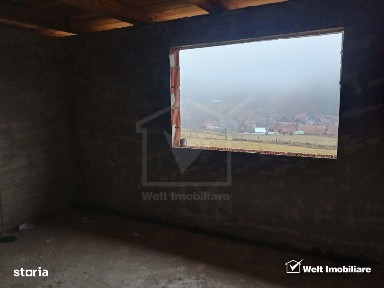 Casa noua la tara cu teren generos