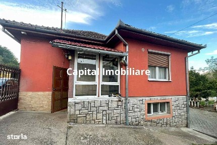 Casa 7 camere, teren 590 mp in Calnic