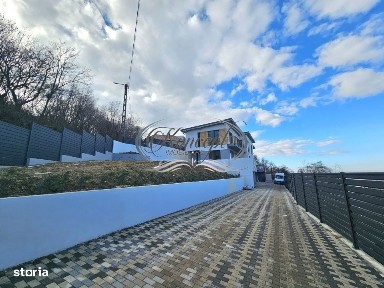 Locuinta D+P+1 Feleacu cu spatii vitrate ample