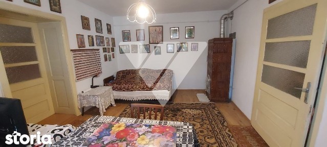 Casa individuala din 2 corpuri 6 camere 2 bai teren 2109 mp Rusi Sibiu