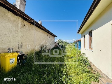 Casa individuala cu 2 corpuri de cladire si teren 625 mp