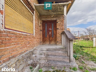 Casă cu teren de 1800 mp, în Buteni, Arad