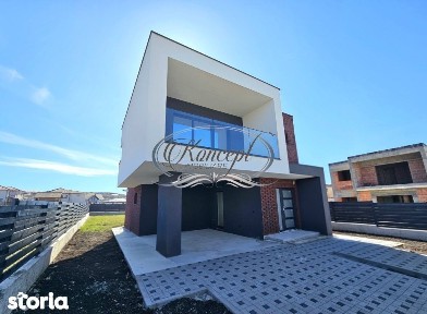 Locuinta moderna cu design cubic si curte plana in Dezmir