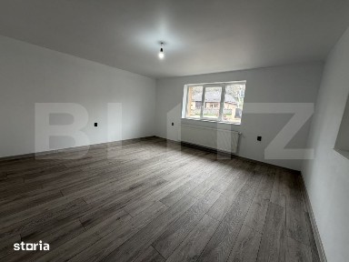 Casa cu 2 camere si un teren de 1000 mp