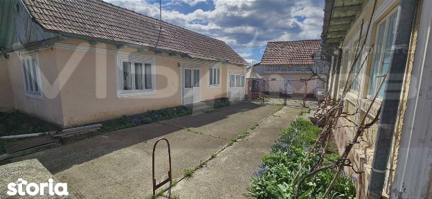 Casă de vânzare la cca.10 km de Onești - Com. Tg. Trotuș