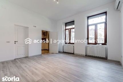 O locuință așezată între două repere ale centrului Aradului