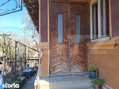 Proprietate cu potential: casa batraneasca + teren 386 mp in Sangeorgi
