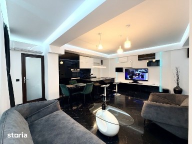 Apartament frumos amenajat de inchiriat cu centrala si parcare