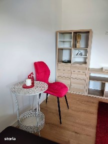 Apartament de închiriat cu grădină, parcare și facilități moderne