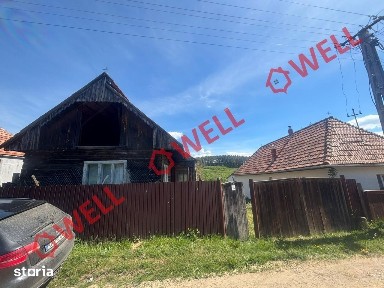 Casă din lemn cu teren de vânzare în Valea Seacă!