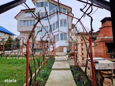 Casa cu 2 apartamente, mansarda si teren 1000 mp - Tomesti
