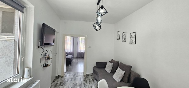 Apartament de vanzare cu terasă și beci, gata de utilizare
