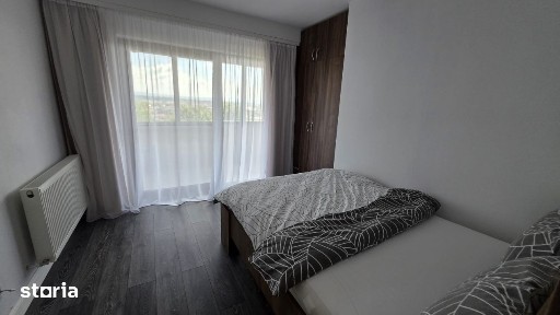 Etaj vila, 2 dormitoare, 100 mp, terasa, gradina 700 mp si 2 parcari