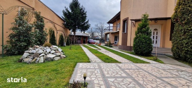 Casa cu 912mp teren 5 camere strada asfaltata